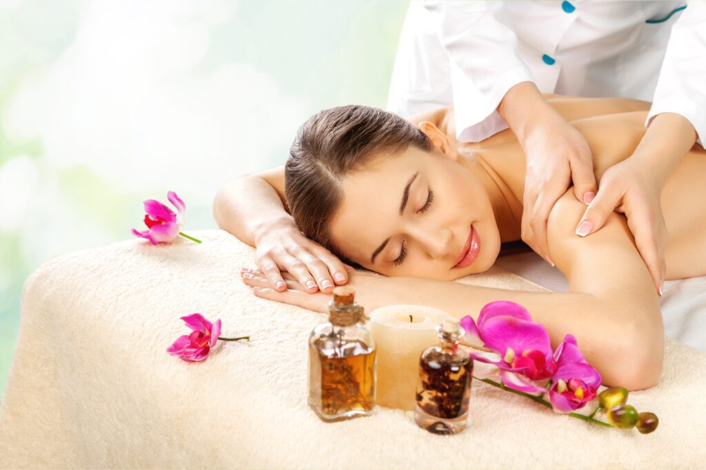 Aromatherapy massage with essential oils at Elysian Luxury Spa for deep relaxation and wellness.
